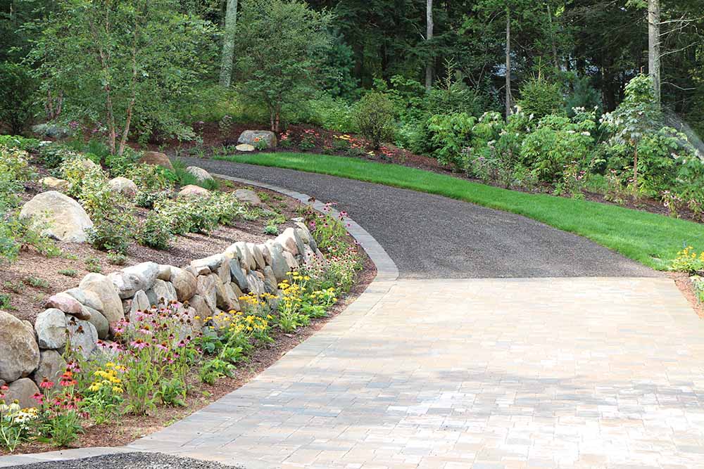 landscape-beds-landscape-ideas-gardens-circular-drive-paver-pad-lake-michigan-home-boulder-wall