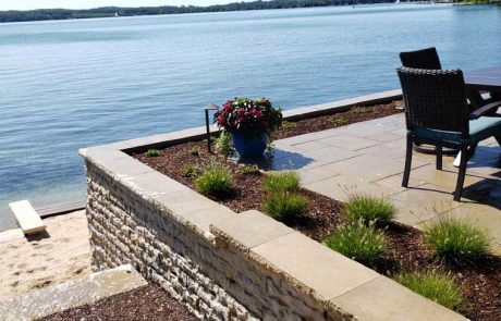 Suttons Bay Michigan Beachfront Remodel with Retaining wall, patio, steps, and built in gardens