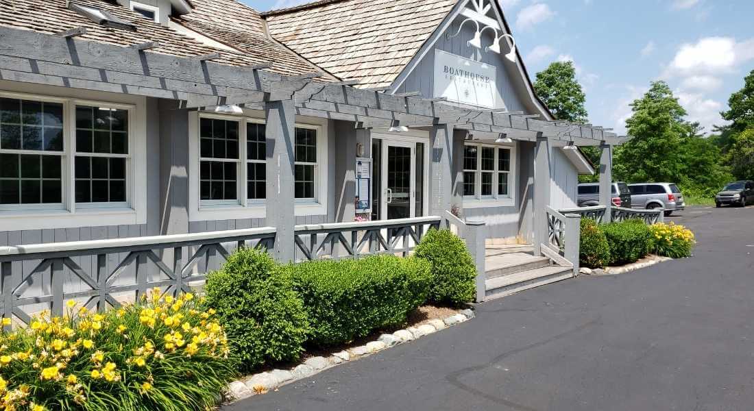 entrance at boathouse restaurant with well maintained landscaping