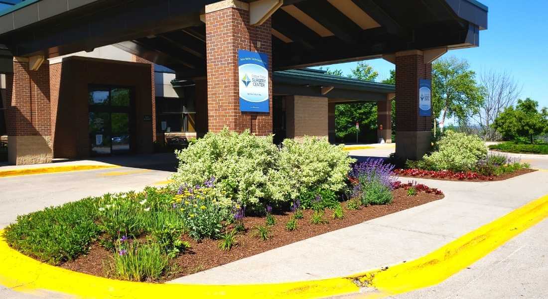 entrance at copper ridge surgery center in traverse city with neatly maintained landscape
