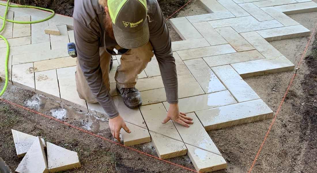 hardscape expert installs walkway