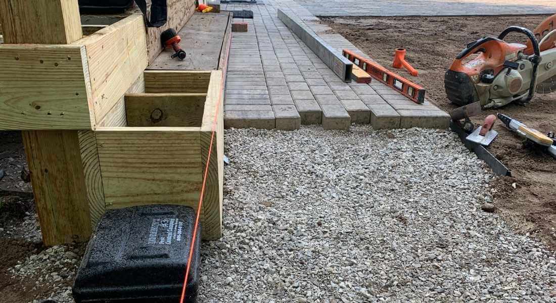 partially installed paver walkway