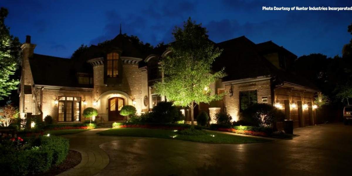 landscape lighting in front yard of home