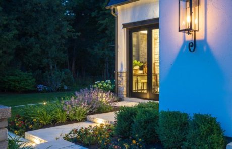 limestone pavers with plantings near home