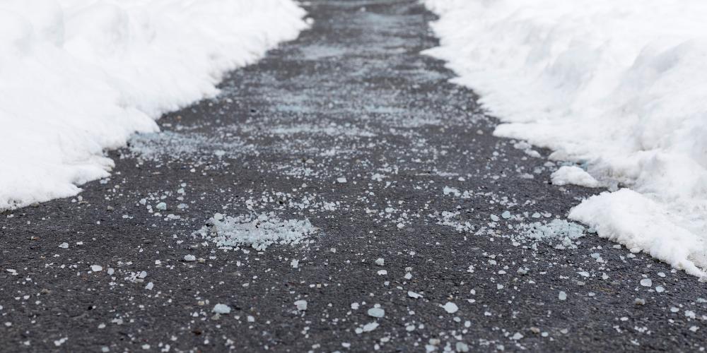 salt on sidewalk with snow