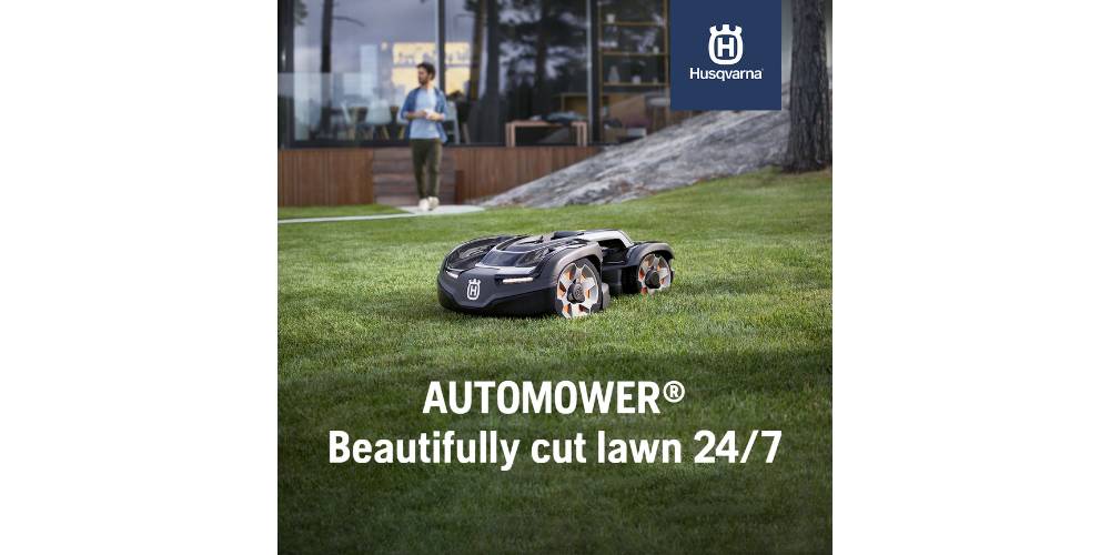automower cuts grass outside home