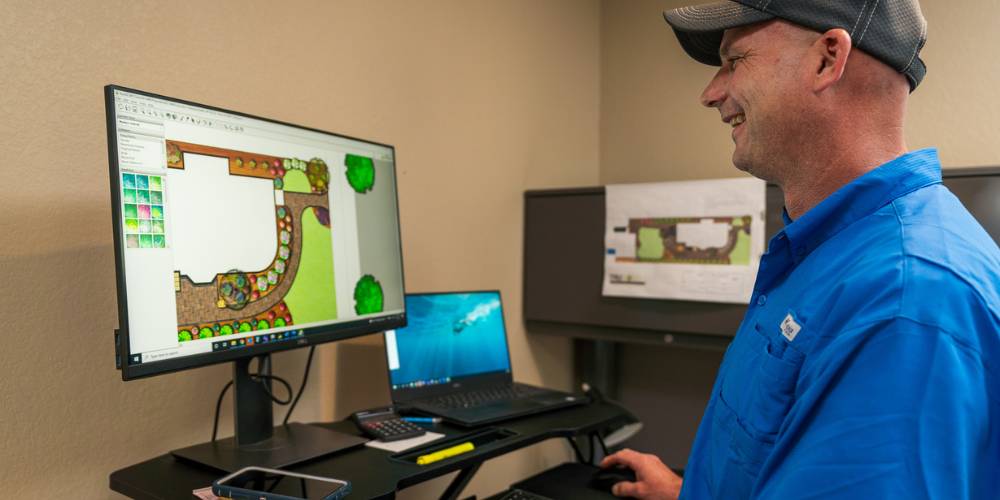 landscape architect works on computer