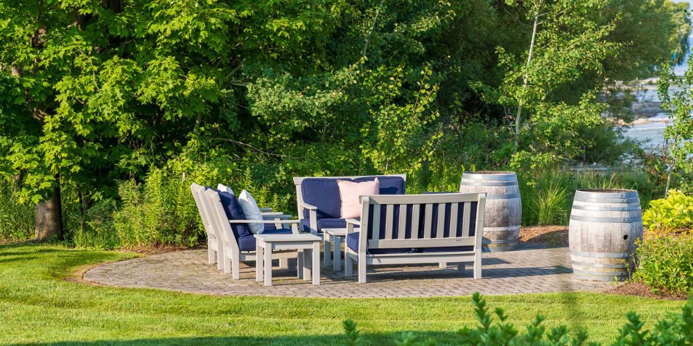 patio with seating and plantings at commercial property